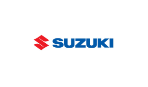 Buzz Adams Voice Actor Suzuki Logo